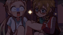 a girl with glasses holds another girl 's leg