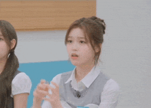 a girl with a name tag that says ' yong ' on it
