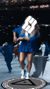 a woman in a blue dress is dancing in front of a circle that says washington