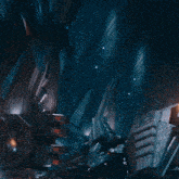 a blurred image of a person jumping over a wall with sparks coming out