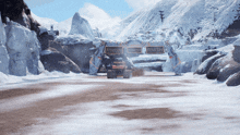 a vehicle is driving past a finish sign in the snowy mountains