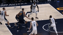 a basketball game is being played on a court that says cain america