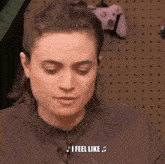 a woman says " i feel like " in front of a xbox controller