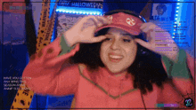 a woman wearing headphones and a hat with a smiley face on it