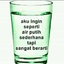 a glass of water with a quote on it that says aku ingin seperti air putih sederhana tapi sangat berarti