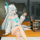 a girl with white hair is sitting on a couch in front of a sign that says ' eo ' on it
