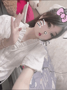 a girl with a hello kitty headband on her head