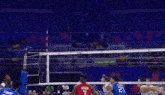a volleyball game is being played in front of a sign that reads saida exit