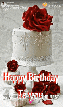 a birthday card with a cake and red roses and the words happy birthday wishing you all the best