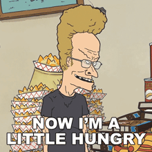a cartoon character says now i 'm a little hungry in front of a pile of chips