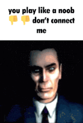 a man in a suit and tie says you play like a noob