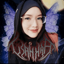 a woman wearing glasses and a hijab is standing in front of a logo that says bahasa