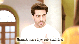 a man in a white shirt with the words jhanak mere liye sab kuch hai written below him