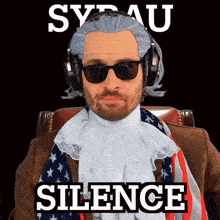 a man wearing a wig and sunglasses is sitting in front of a sign that says syeau silence