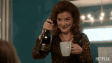 Pour Champagne Lorna Harding GIF - Pour Champagne Lorna Harding Valerie Mahaffey GIFs