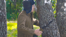 badcomedian soldier tree hugs gun