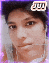 a close up of a person 's face with a sticker that says july