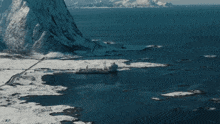 an aerial view of an explosion in the ocean