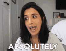 a woman says absolutely in front of a white background