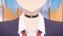 a close up of a girl 's neck with a choker