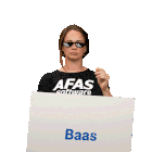 a woman wearing a afas software shirt holds a sign