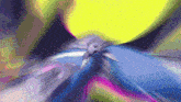 a blurred image of a butterfly flying in the air