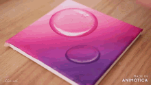 a pink and purple painting with water drops made by chloe art