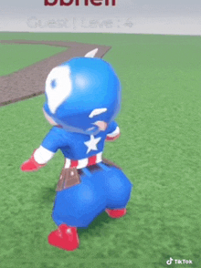 a cartoon character in a captain america costume is standing on a grassy field .