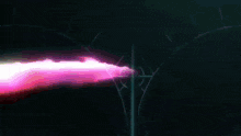 a purple and red light is coming out of a dark room .