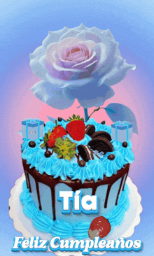 a birthday cake with blue frosting and a purple rose on top