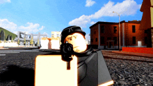 a cartoon character with a sniper rifle is standing in front of a brick building