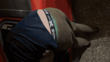 a person wearing a pair of under armour pants