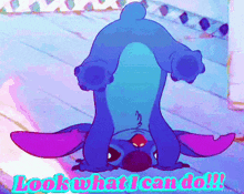 a cartoon of stitch doing a handstand with the words " looks what i can do " below it