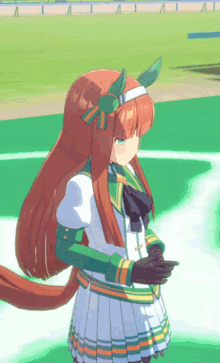 a girl with long red hair is wearing a white and green outfit