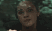 a close up of a woman 's face with the words rbd.gif below
