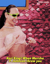 a woman wearing sunglasses and a pink top says kori king when marsha p. johnson threw you