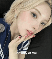 a picture of a woman with the words bae only of val below it