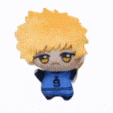 a stuffed toy of a boy with yellow hair and a blue shirt on a white background .