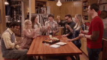 Cheers GIF - Big Bang Theory Cheers Drinking GIFs