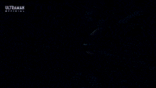 a blue background with the word ultraman on the bottom