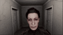 a woman 's face is shown in a dark room with doors