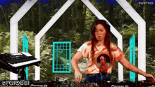 a woman is playing a pioneer dj set
