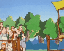 a group of people standing around a fence in a park