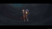a man in a knight 's armor is flying through the air while holding a torch .