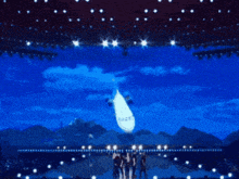a plane is flying in the sky above a crowd