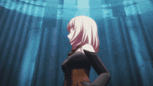 a girl in a black dress is standing in front of a blue curtain
