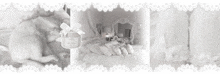 a black and white photo of a cat laying on a bed with a candle .