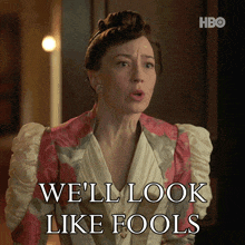 a woman says we 'll look like fools while wearing a floral dress