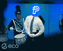 a man in a marching band playing drums with a blue circle with a p on it