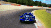 a blue race car with the number 21 on the back